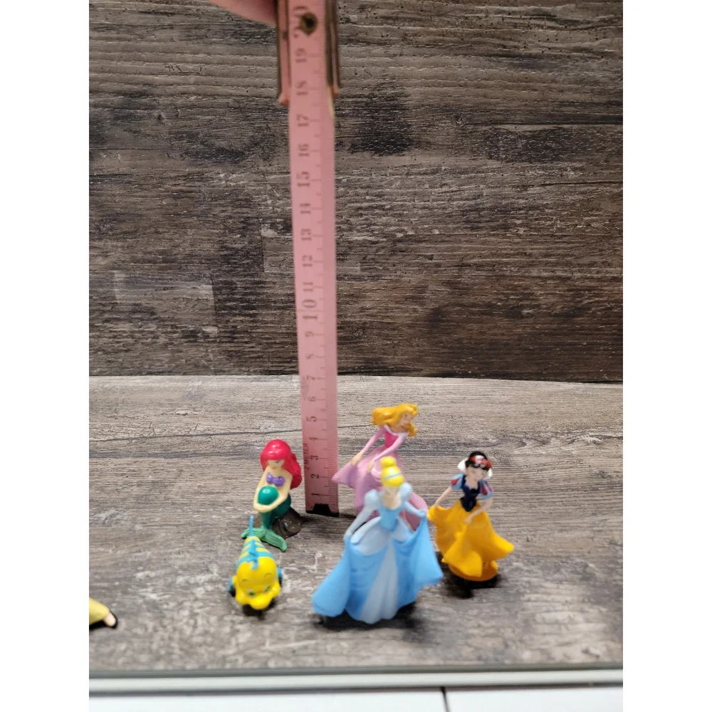 Lot of Disney Princess Figures.